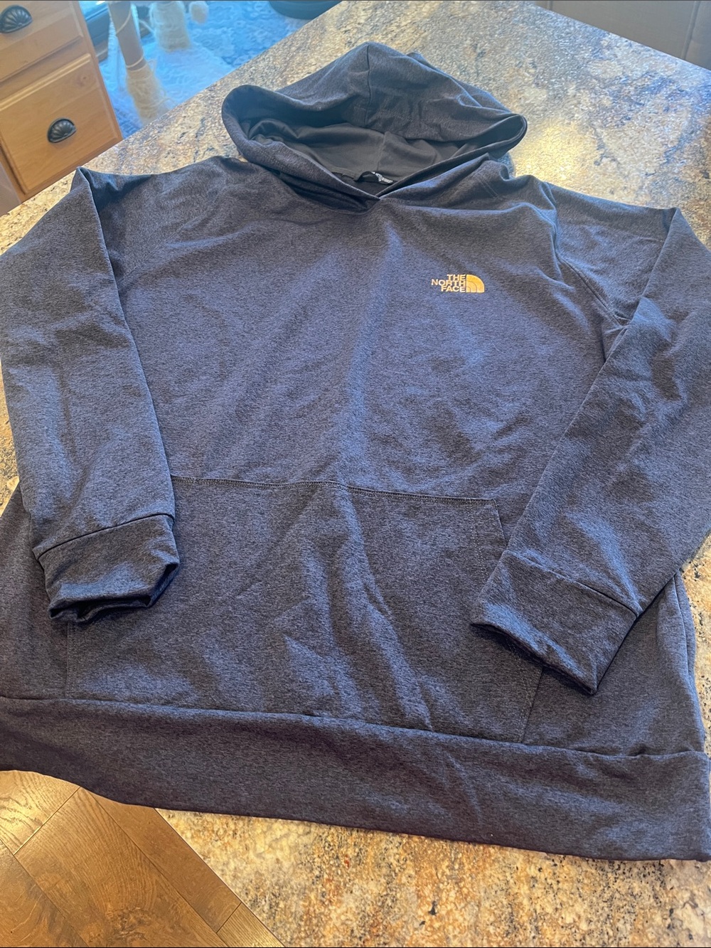 The North Face charcoal grey Pullover Hoodie with rose gold Logo